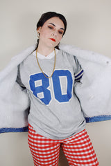 vintage 1980's Levi's San Francisco, Made in USA long sleeve light denim button up jacket with white shearling liner