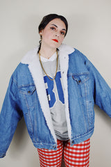 vintage 1980's Levi's San Francisco, Made in USA long sleeve light denim button up jacket with white shearling liner