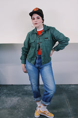 Women's or men's vintage 1990's Dickies label long sleeve green button up lightweight jacket with two chest pockets and collar.