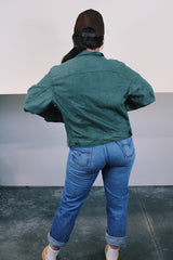 Women's or men's vintage 1990's Dickies label long sleeve green button up lightweight jacket with two chest pockets and collar.