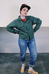 Women's or men's vintage 1990's Dickies label long sleeve green button up lightweight jacket with two chest pockets and collar.