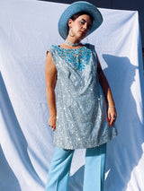 silver metallic tinsel sleeveless long top and shorts with blue beaded detail around chest and hem of shorts, costume vintage 1980's saks ally