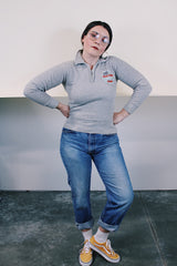 Women's vintage 1970's Healthknit label long sleeve heather grey pullover sweater with half zipper closure, collar, and patch sewn on left chest.