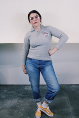 Women's vintage 1970's Healthknit label long sleeve heather grey pullover sweater with half zipper closure, collar, and patch sewn on left chest.Women's vintage 1970's Healthknit label long sleeve heather grey pullover sweater with half zipper closure, collar, and patch sewn on left chest.