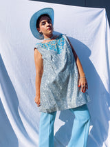 silver metallic tinsel sleeveless long top and shorts with blue beaded detail around chest and hem of shorts, costume vintage 1980's saks ally