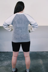 Women's vintage 1970's Snow Country long sleeve grey and white pullover sweater with V shaped neckline and nubby texture acrylic material.