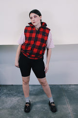 Women's or men's vintage 1980's Ozark Trail label sleeveless zip up black and red buffalo plaid vest with side pockets in cotton material.