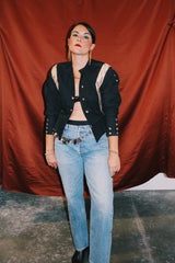 long sleeve black new wave vintage 1980's jacket with decorative stud buttons and gold metallic trim