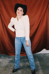 long sleeve cream double breasted wool jacket with puff shoulders and mandarin collar neckline vintage women's 1980's