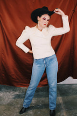 long sleeve cream double breasted wool jacket with puff shoulders and mandarin collar neckline vintage women's 1980's