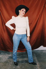 long sleeve cream double breasted wool jacket with puff shoulders and mandarin collar neckline vintage women's 1980's