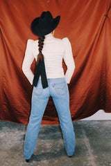 long sleeve cream double breasted wool jacket with puff shoulders and mandarin collar neckline vintage women's 1980's