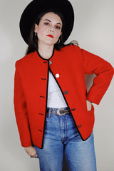 Women's vintage 1970's Boos Austrian Style label, made in Austria long sleeve button up wool jacket in bright red with black trim
