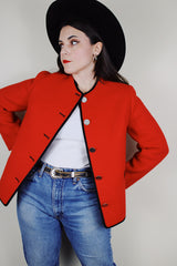 Women's vintage 1970's Boos Austrian Style label, made in Austria long sleeve button up wool jacket in bright red with black trim