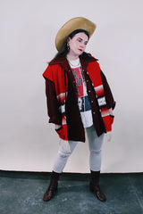 Men's vintage 1970's Time Out West by Farah, Made in USA label long sleeve maroon colored polyester western style shirt with pearl popper buttons and white contrast stitching.