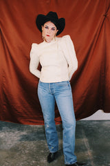 long sleeve cream double breasted wool jacket with puff shoulders and mandarin collar neckline vintage women's 1980's