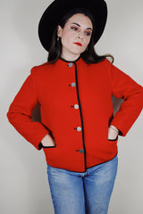 Women's vintage 1970's Boos Austrian Style label, made in Austria long sleeve button up wool jacket in bright red with black trim
