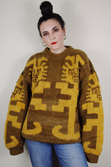 vintage 1980's Amano label, hand knit in Equador, XL 100% wool long sleeve pullover sweater in light brown with an all over yellow print
