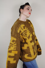 vintage 1980's Amano label, hand knit in Equador, XL 100% wool long sleeve pullover sweater in light brown with an all over yellow print