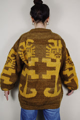 vintage 1980's Amano label, hand knit in Equador, XL 100% wool long sleeve pullover sweater in light brown with an all over yellow print