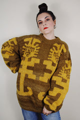 vintage 1980's Amano label, hand knit in Equador, XL 100% wool long sleeve pullover sweater in light brown with an all over yellow print