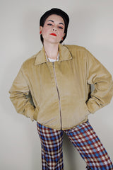 vintage 1980's long sleeve beige brown corduroy jacket with bronze zipper up the front, a pointy collar and side pockets