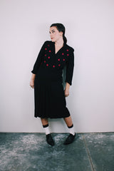 vintage 1940's black midi dress with pink polka dots across chest