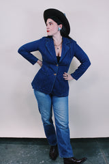 Women's vintage western style 1970's dark wash denim blazer with two wood buttons, two pockets, double lapel in cotton material.