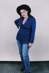 Women's vintage western style 1970's dark wash denim blazer with two wood buttons, two pockets, double lapel in cotton material.