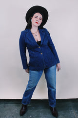 Women's vintage western style 1970's dark wash denim blazer with two wood buttons, two pockets, double lapel in cotton material.