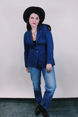 Women's vintage western style 1970's dark wash denim blazer with two wood buttons, two pockets, double lapel in cotton material.