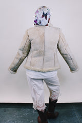 Women's or men's western style vintage 1970's Knight Tailors LTD label long sleeve short length cream colored suede jacket with shearling liner and trim.