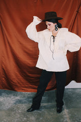 long sleeve cream cotton pirate blouse with ruffle collar and tie front and matching belt vintage