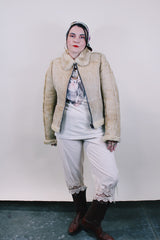 Women's or men's western style vintage 1970's Knight Tailors LTD label long sleeve short length cream colored suede jacket with shearling liner and trim.