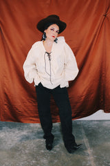 long sleeve cream cotton pirate blouse with ruffle collar and tie front and matching belt vintage