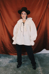 long sleeve cream cotton pirate blouse with ruffle collar and tie front and matching belt vintage