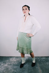 long sleeve white acrylic button up cardigan sweater with diamond and ribbon trim on front women's vintage 1960's