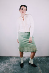 long sleeve white acrylic button up cardigan sweater with diamond and ribbon trim on front women's vintage 1960's