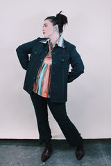 Women's or men's vintage western style 1970's dark forest green polyester two piece suit and jacket suit. Light green contrast thread throughout.