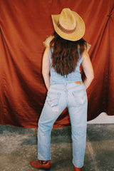 sleeveless denim vest with bronze button closure vintage 1980's