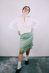 long sleeve white acrylic button up cardigan sweater with diamond and ribbon trim on front women's vintage 1960's