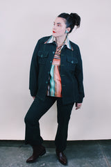 Women's or men's vintage western style 1970's dark forest green polyester two piece suit and jacket suit. Light green contrast thread throughout.