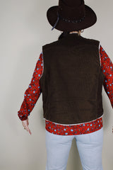 Men's vintage 1970's Levi's sleeveless brown corduroy vest with a cream shearling liner and popper buttons up the front