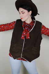 Men's vintage 1970's Levi's sleeveless brown corduroy vest with a cream shearling liner and popper buttons up the front