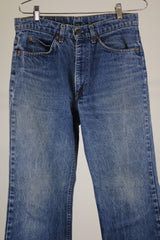 SF 207 levi's jeans 30 width x 33 length in a medium wash