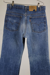 SF 207 levi's jeans 30 width x 33 length in a medium wash