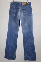 SF 207 levi's jeans 30 width x 33 length in a medium wash