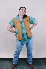 Women's or men's western style vintage 1970's sleeveless brown tan colored suede vest with all over teal colored hand painting.