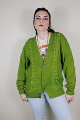 vintage 1960's SKM Penguin, Seattle Knitting Mills label long sleeve green button up wool cardigan with braiding detail on each side and tan leather patches on the elbows
