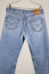501 light wash levi's denim jeans with five button closure
